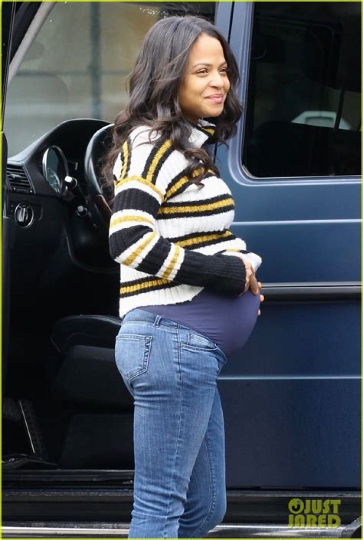 Christina Milian Shows Off Baby Bump in Glam Crop Top at Baby Shower