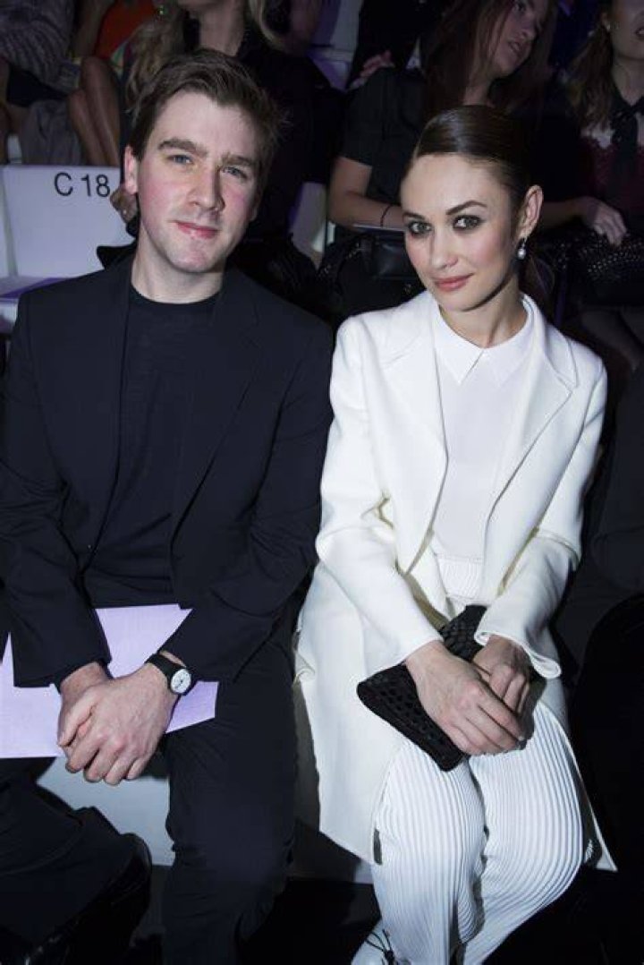 Olga Kurylenko et son amoureux Max Benitz en front row lors du d&eacute;fil&eacute;