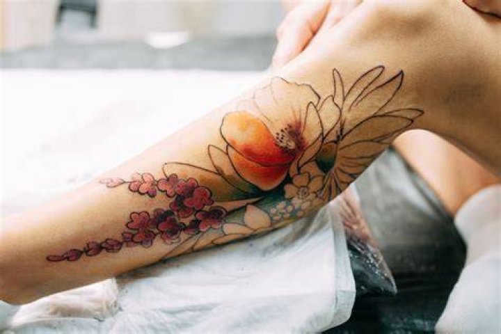 Unveiling The Enchanting World Of Flower Leg Tattoos: Discoveries And Insights Await