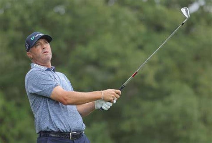 Who is Ryan Palmer's caddie?
